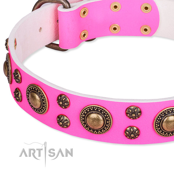 Pink leather dog collar with firmly fixed decorations